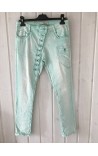 Pants med skrå knaplukning